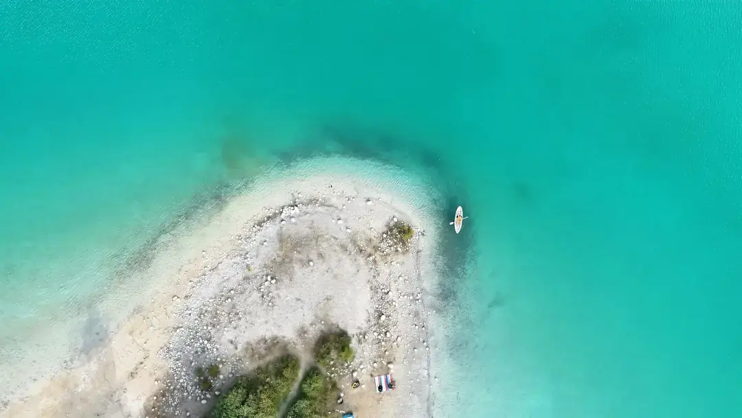 Aerial view of the stunning turquoise waters and white sand of Balos Lagoon in Crete, Greece.