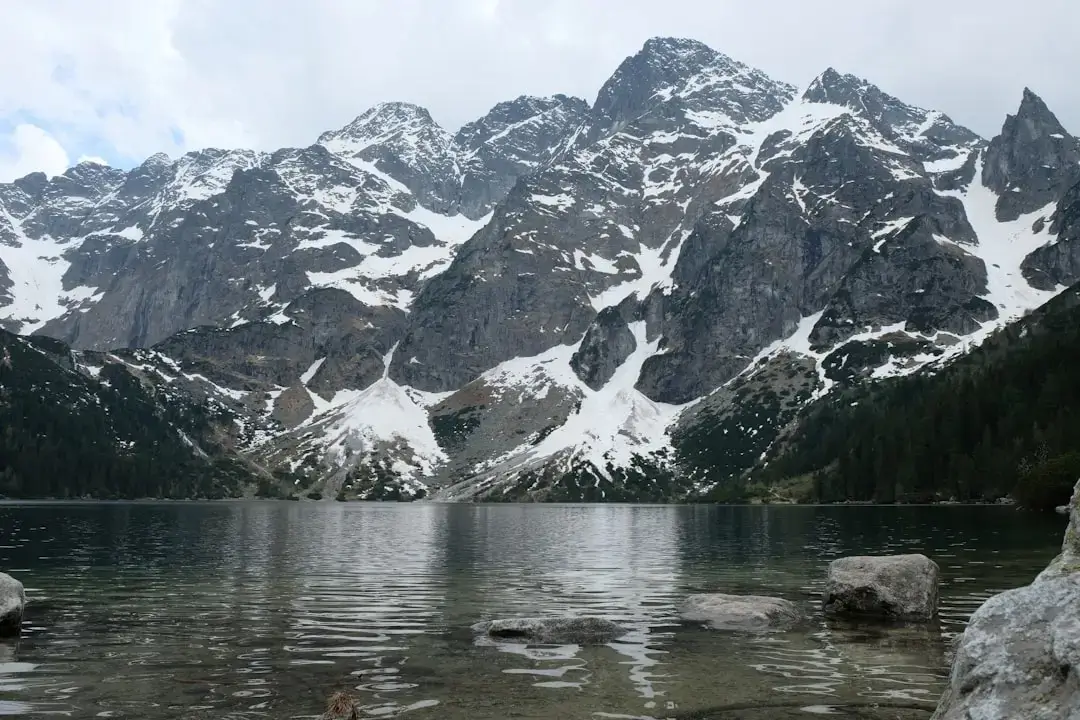 Scenic panoramic view of the snow-capped Tatra Mountains from Bukowina Tatrzanska in Poland