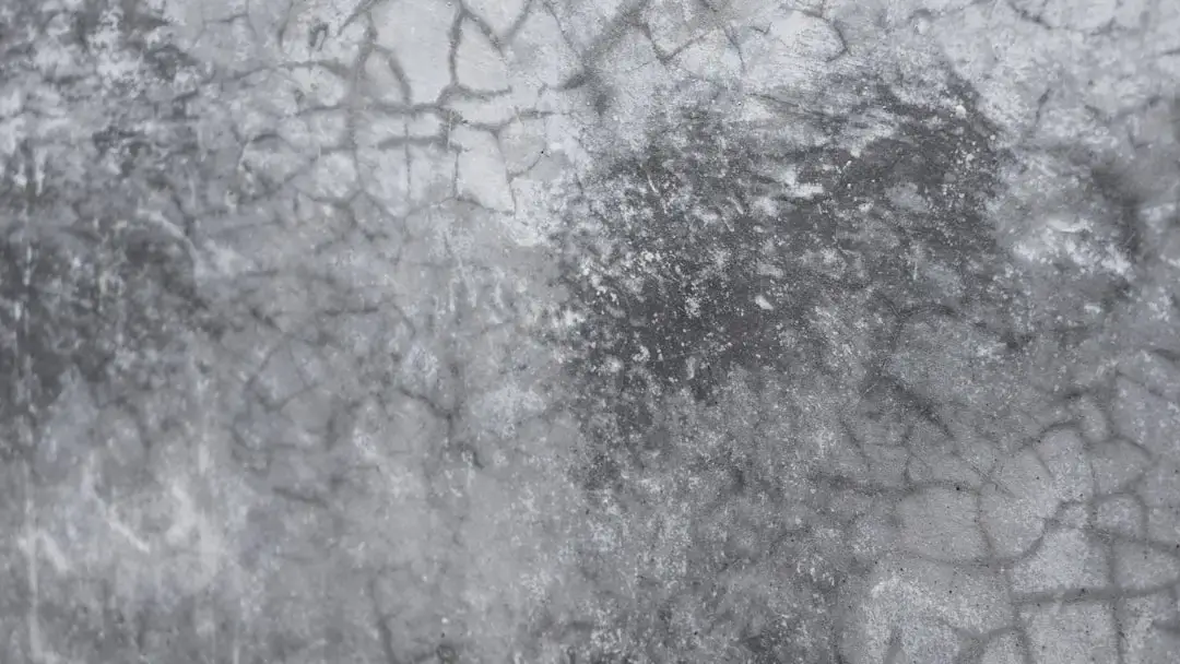 Close-up detailed texture of a car windshield glass surface with subtle reflections
