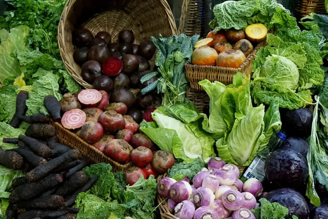 An abundant display of colorful, freshly harvested organic vegetables at a local farmers market