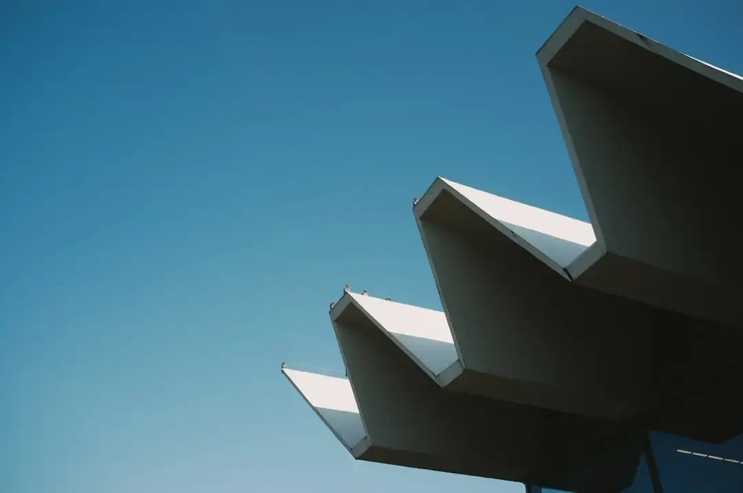 An array of modern photovoltaic solar panels installed on a residential roof to generate clean, renewable energy.