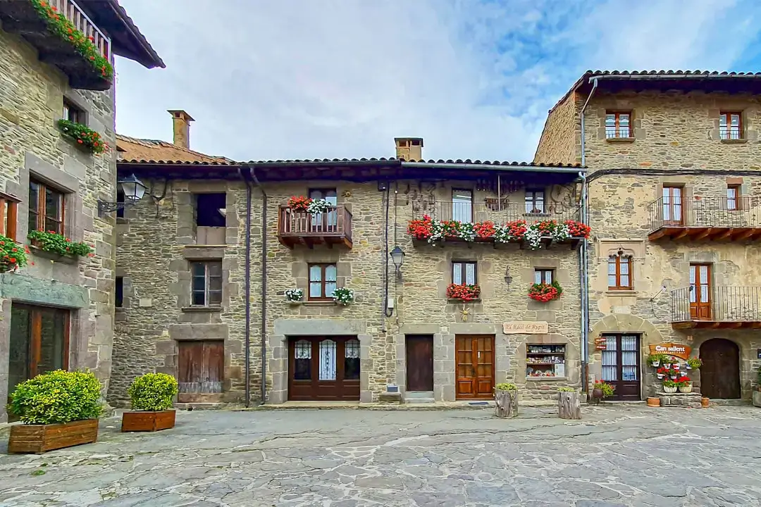 Traditional stone houses built into giant granite boulders in the historic village of Monsanto, Portugal.
