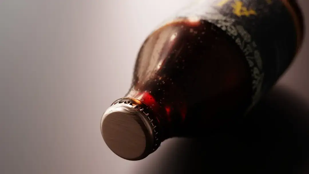 A selection of artisanal craft beer bottles arranged on a wooden bar counter