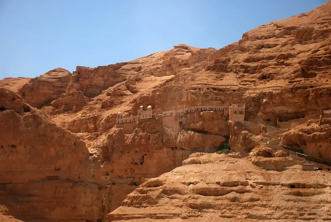Ancient stone architecture of Saint Catherine's Monastery at the foot of Mount Sinai in the Egyptian desert.