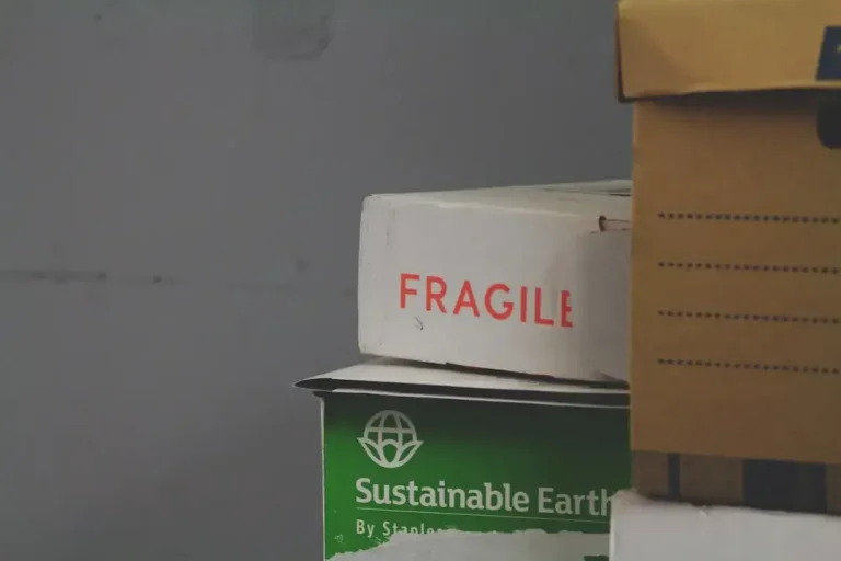 white and red Fragile labeled box