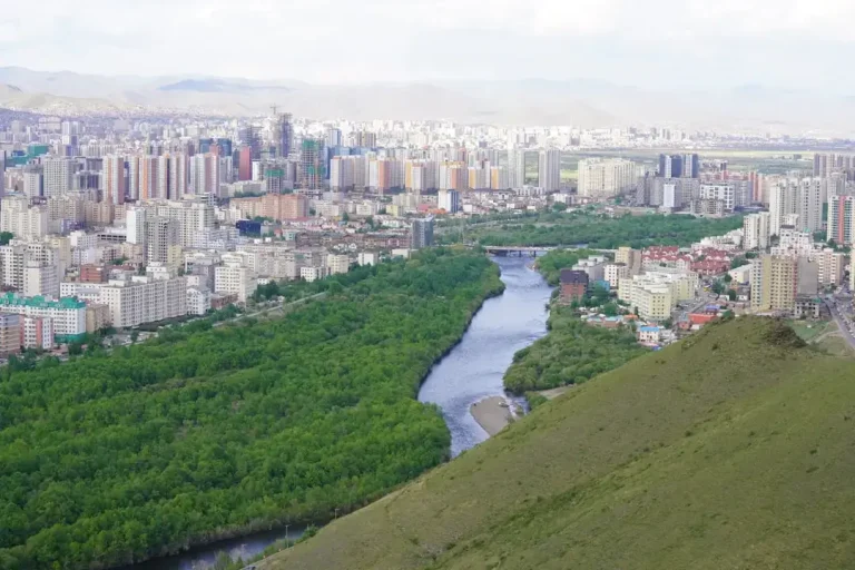 An aerial view of a city and a river