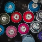 blue red green and purple round plastic containers