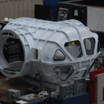 grey plastic capsule