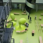 people walking on green floor tiles
