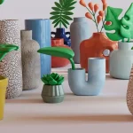 a group of vases with plants in them