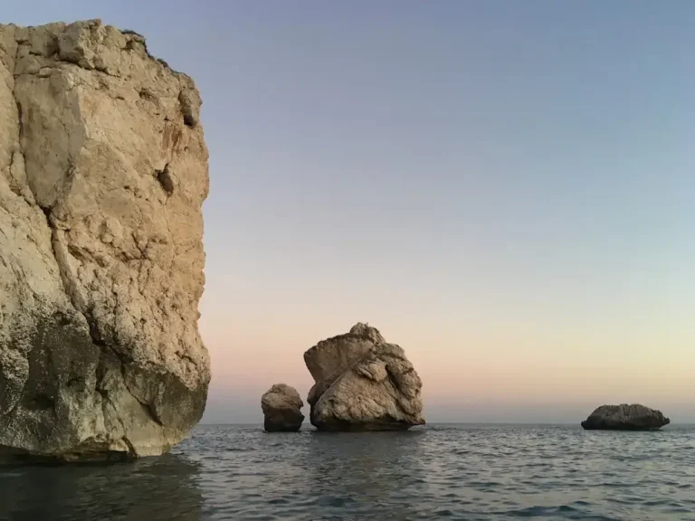 A beautiful view of the crystal clear turquoise sea and rocky coastline in Cyprus during the sunny month of May.