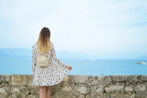 Scenic view of a peaceful coastal town in Corfu, representing safety and tranquility for travelers visiting Greece.